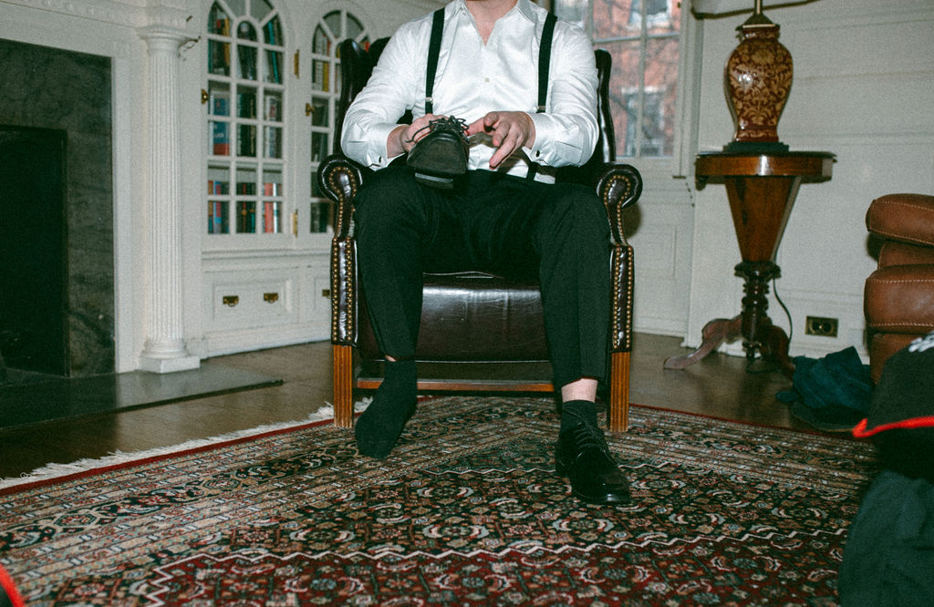 A groom gets dressed for his Philadelphia wedding 