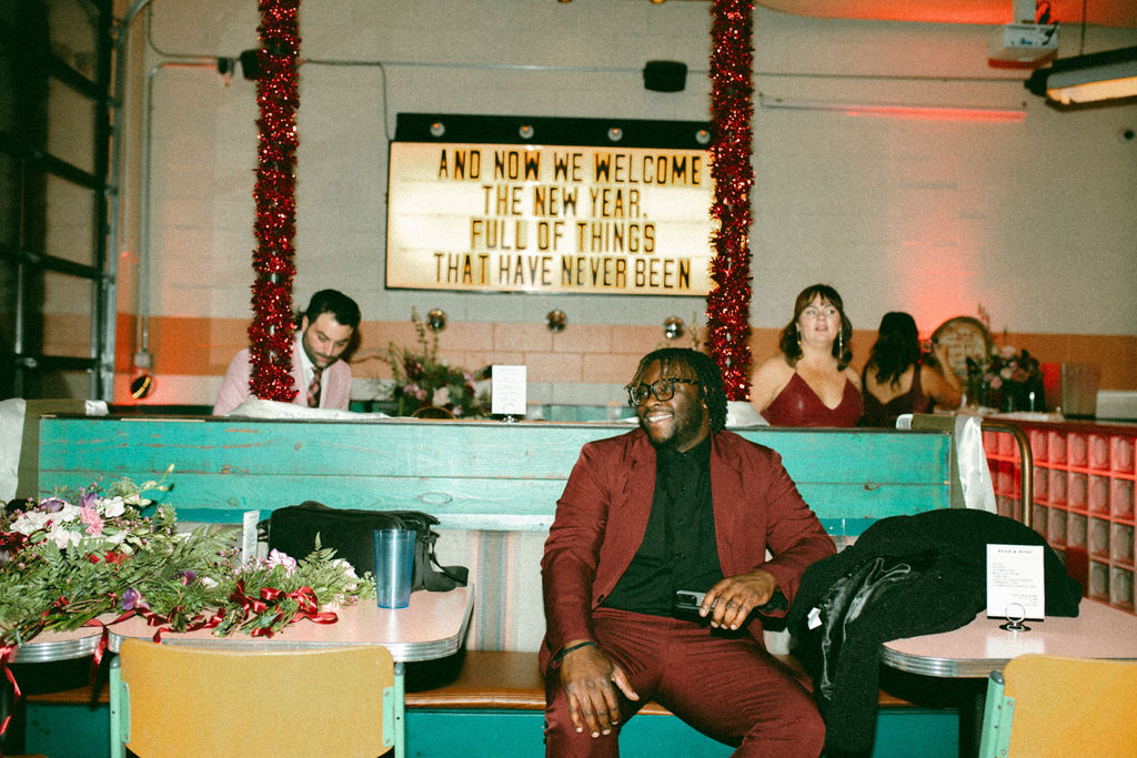 Wedding guests look on at a NYE wedding reception held at La Chinesca Philly 