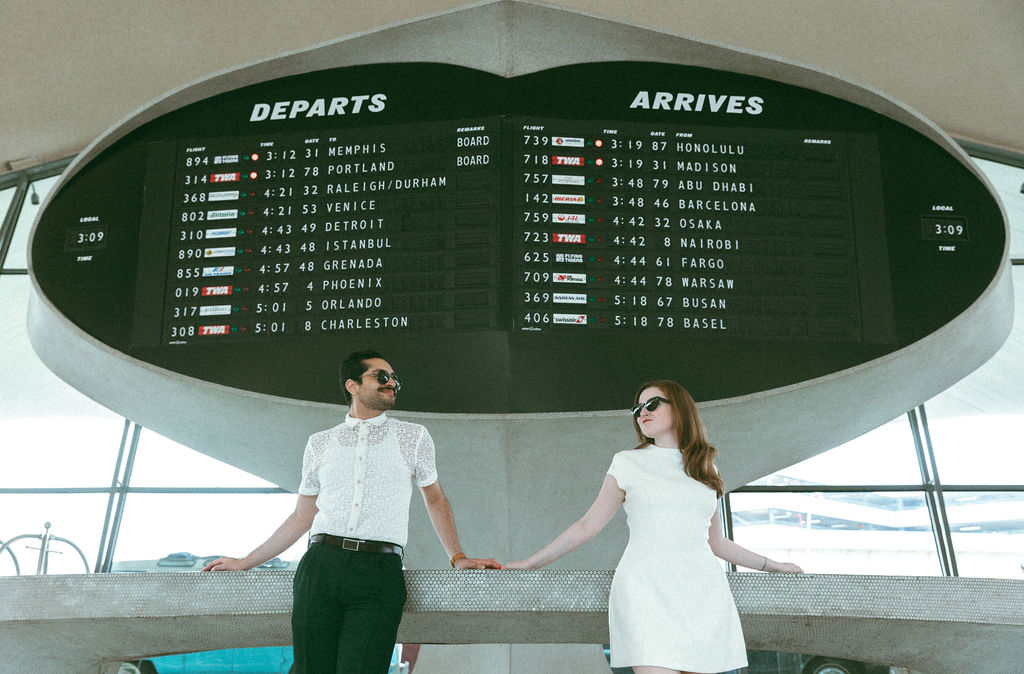 Wedding Couple Posed in the TWA Hotel Lobby